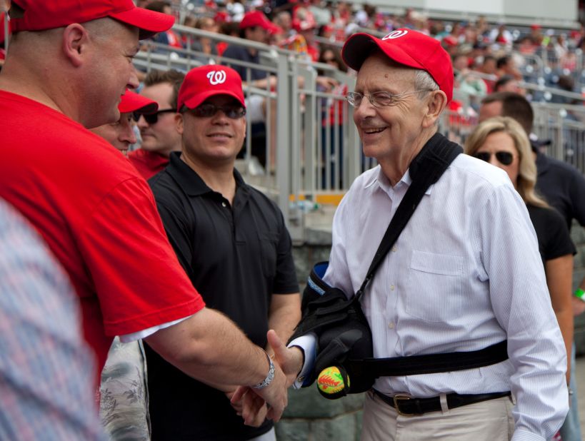 Breyer greets members of the military and their families at a Washington Nationals baseball game in June 2013.