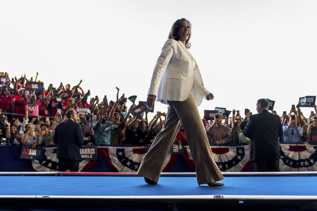 Harris arrives to speak at her campaign rally at Detroit Metropolitan Airport on August 7, 2024.