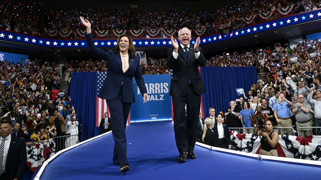 US Vice President Kamala Harris and her running mate Minnesota Gov. Tim Walz arrive to speak at Temple University's Liacouras Center in Philadelphia, Pennsylvania, August 6, 2024.